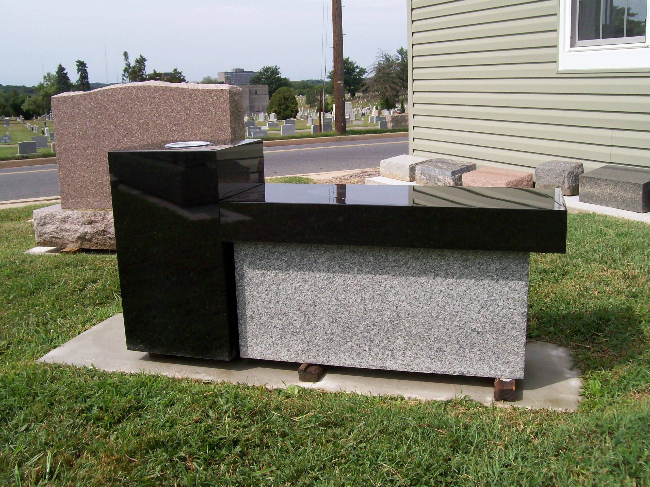 Image of a cemetery bench on Tegeler Monument Company's website