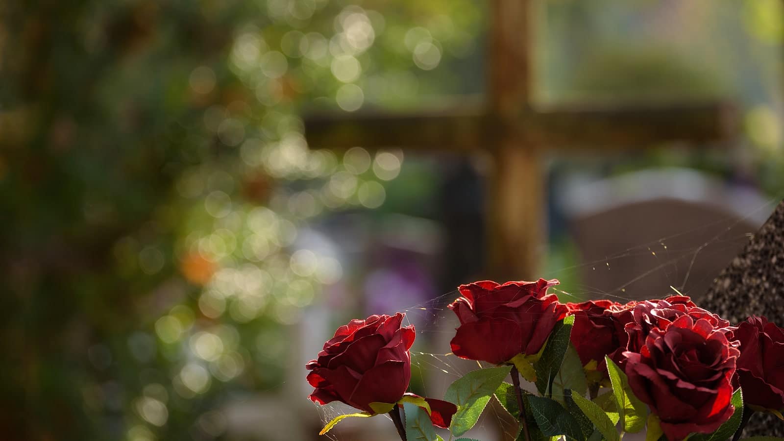 Image of flowers on a headstone on Tegeler's website