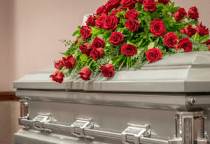 Image of a casket covered in roses on Tegeler's website