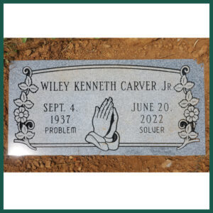 Carver Image of a flat headstone
