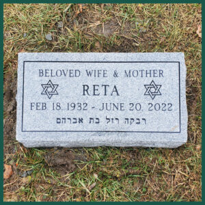 Reta Image of a flat headstone